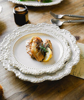 Baroque ceramic dinner plates in assorted sizes