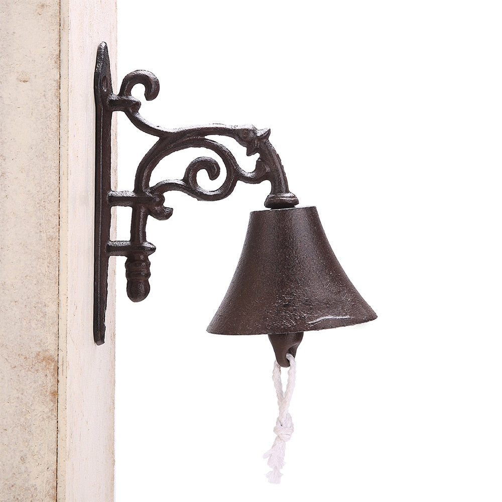Scroll-style retro iron bell for rustic entryway