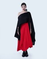 Draped one-shoulder black linen blouse with sculptural silhouette