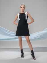 Black and white Fara cocktail dress with sculptural bow details