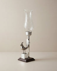 Decorative bird candle stand on black base