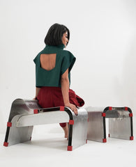 Green structured blouse with open back