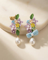 Handmade brass earrings with enamel flowers and pearl drop