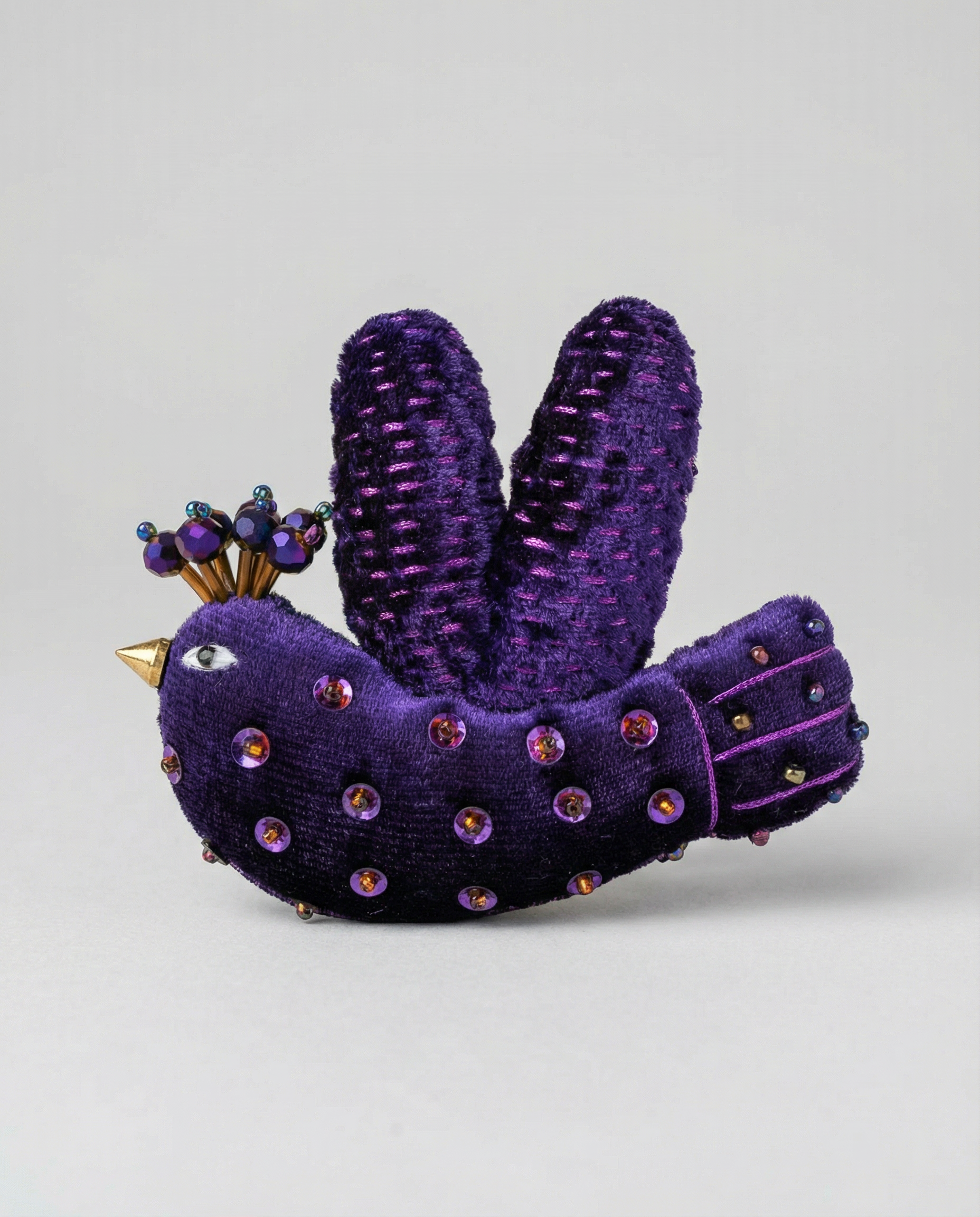 Statement embroidered bird brooch in purple velvet