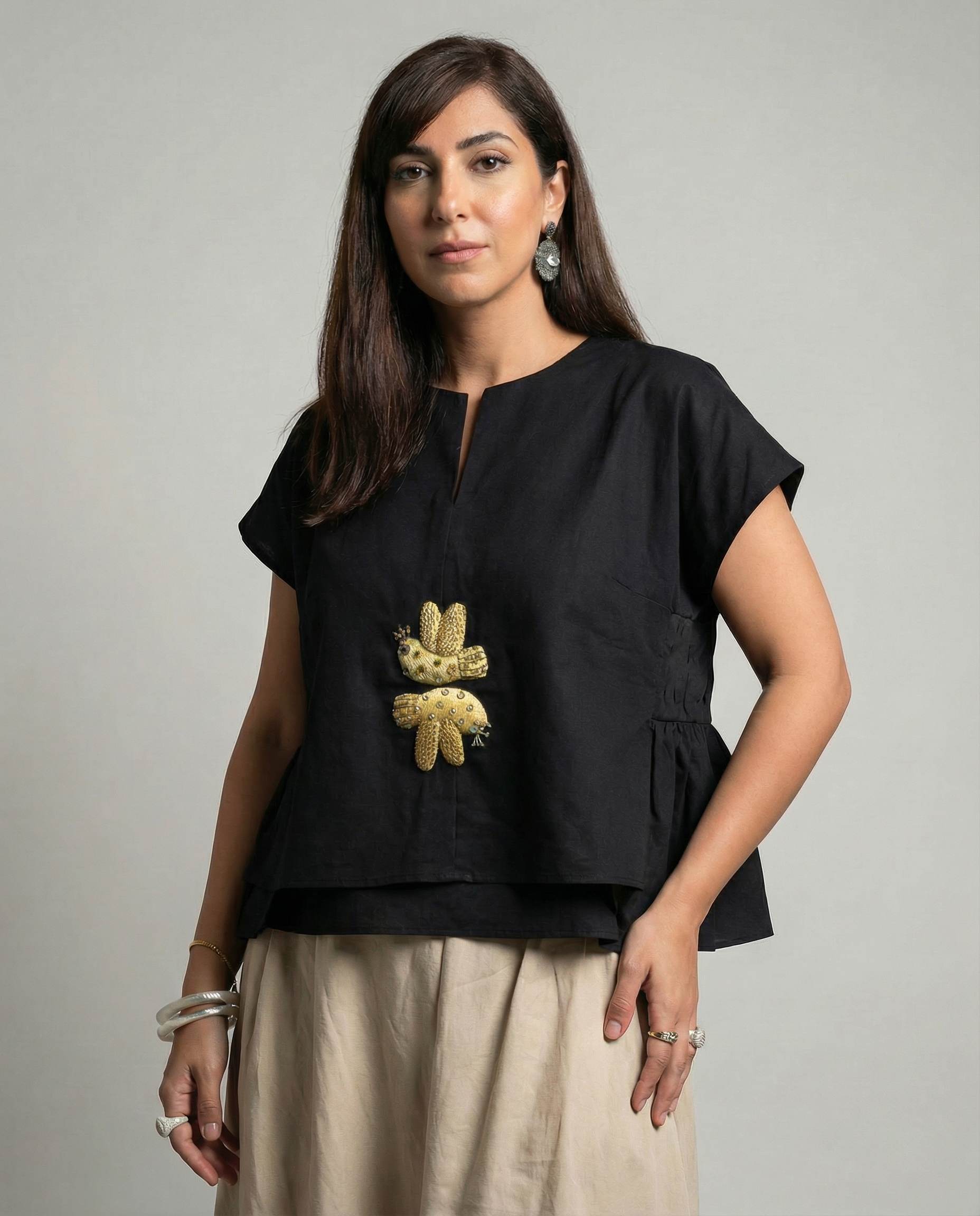 Handmade velvet bird brooch with sequins and crown detail