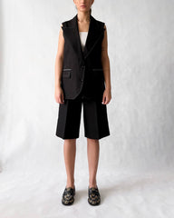 Minimalist blazer vest with flap pockets and contrast stitching