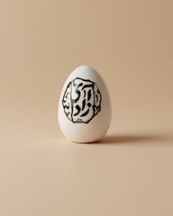 Minimal white Persian decorative egg for Nowruz table decoration