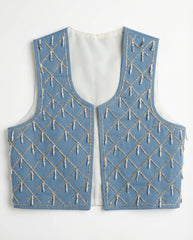 Blue embroidered vest on a white background