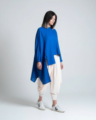 Oversized linen shirt in royal blue with balloon sleeves, studio shot
