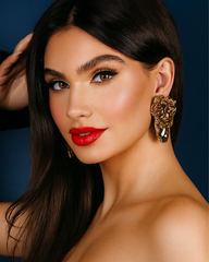 Artistic sculptural statement earrings featuring brown faceted stones