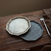 Rustic vintage iron tray on wood surface