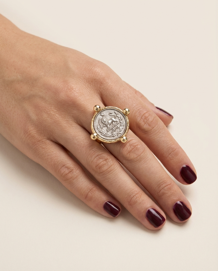 Persian coin statement ring on hand