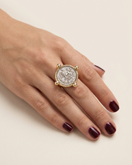 Persian coin statement ring on hand