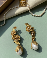 Artisan brass jewelry with textured floral design