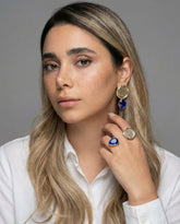 coin drop earrings with emerald teardrop stones