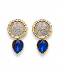 Earrings with coin-like tops and blue teardrop stones on a white background