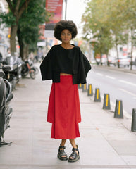 Structured gabardine midi skirt in red with asymmetric panel