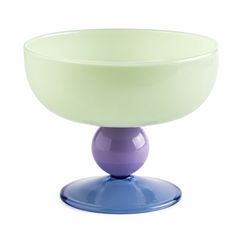 Colorful glass bowl with a stand on a white background