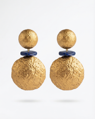 Bold gold papier-mâché statement earrings with blue stone detail