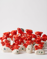 Handmade red ceramic fish for Haft Seen table