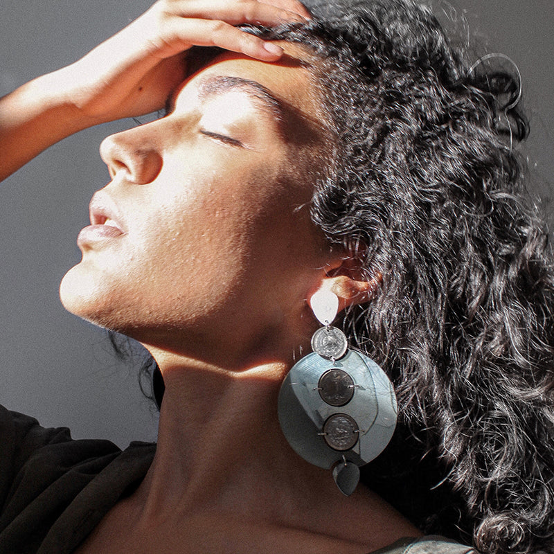 Handcrafted reflective metal statement earrings