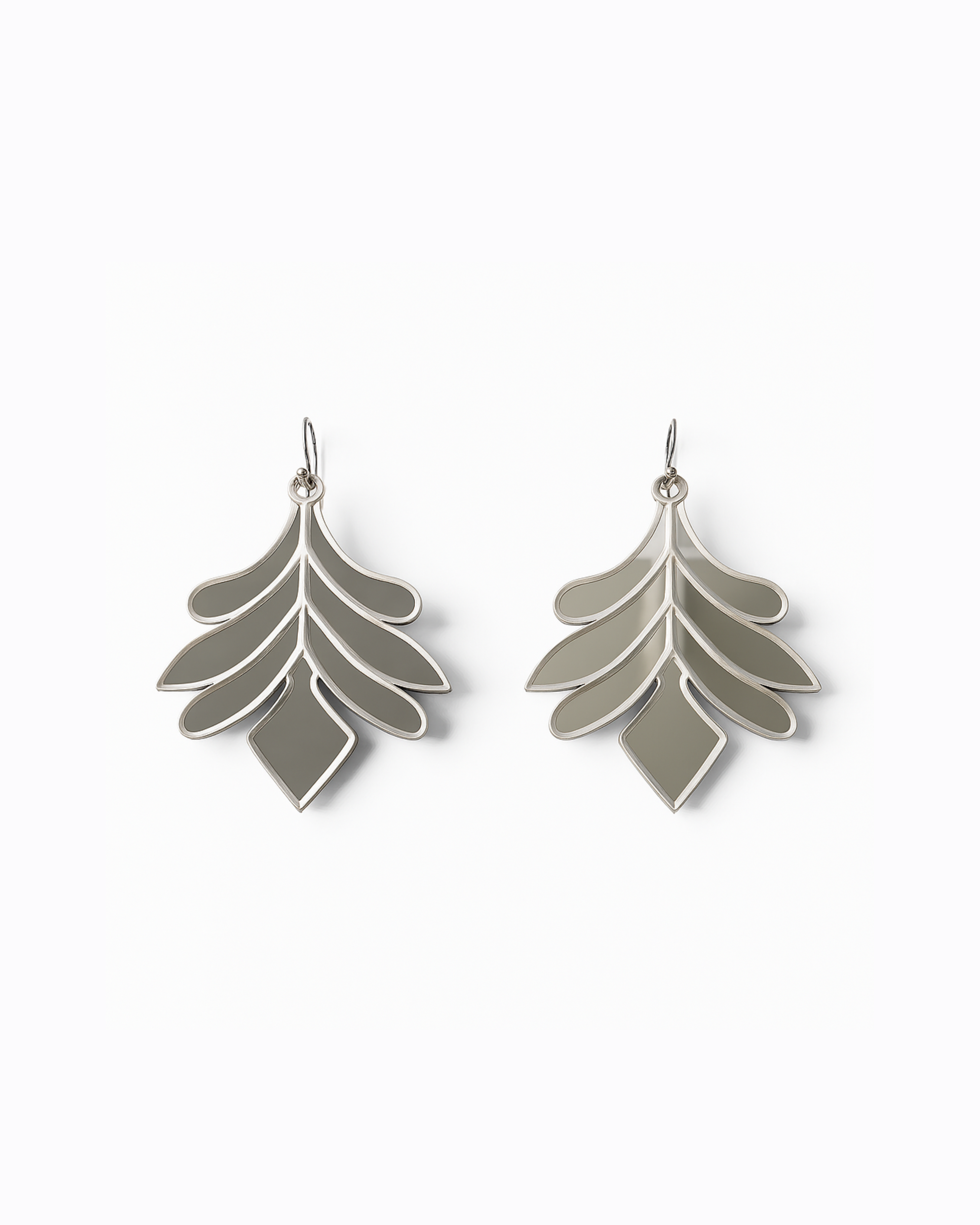 Almas mirror-finish handmade earrings with leaf motif