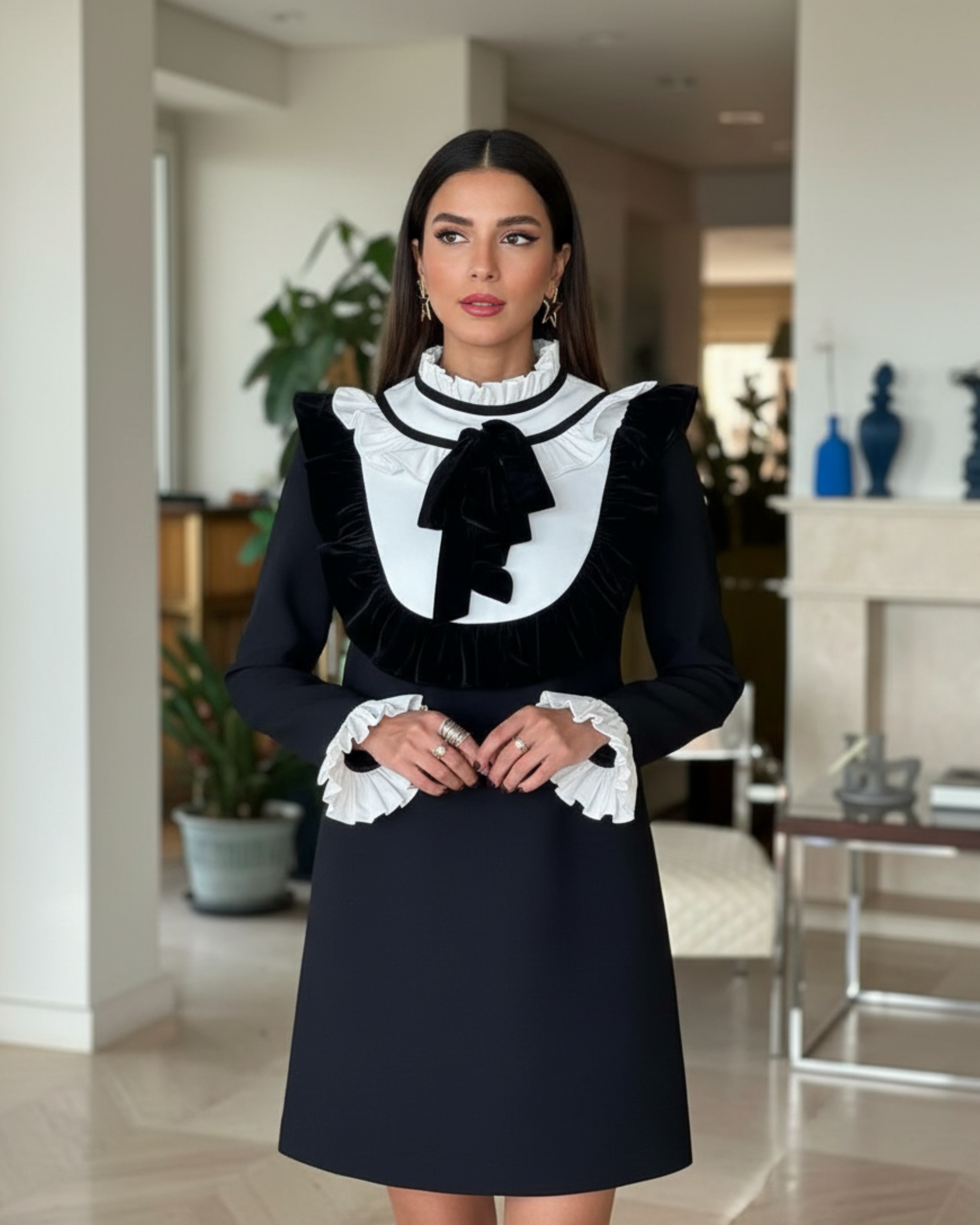 Elegant cocktail dress with ruffled collar and velvet trim