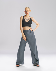Wide leg tailored grey trousers on model