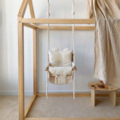 Wooden baby swing with fabric seat and cotton ropes