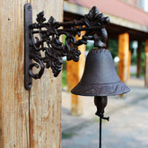 Vintage cast iron wall bell for outdoor decor