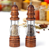 Wooden salt and pepper mill set on kitchen counter