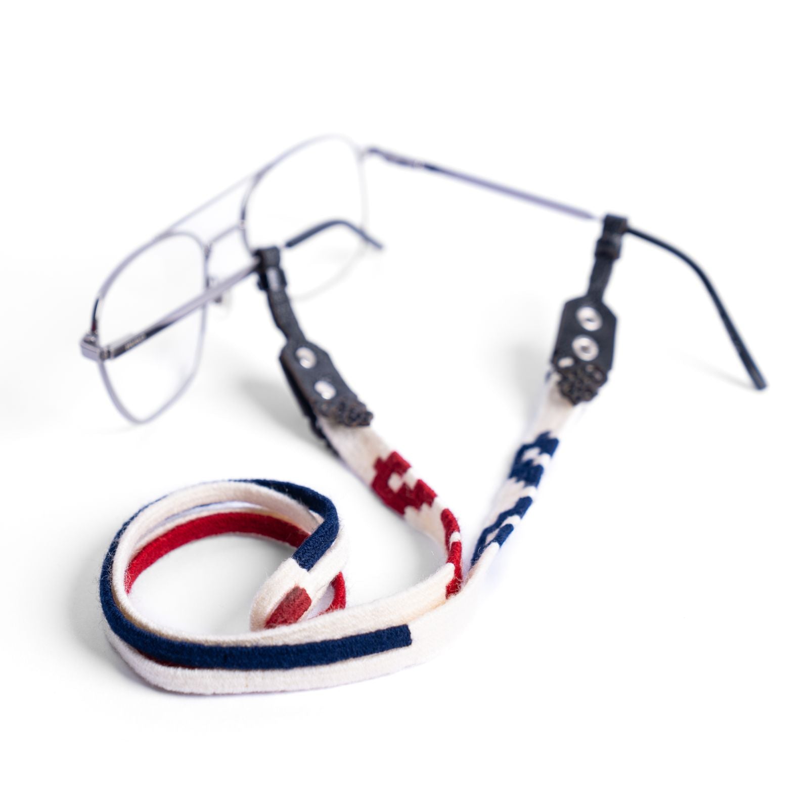 Artisan handmade eyeglass holder in red, navy, and cream