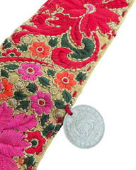 Decorative embroidered waist belt on neutral background