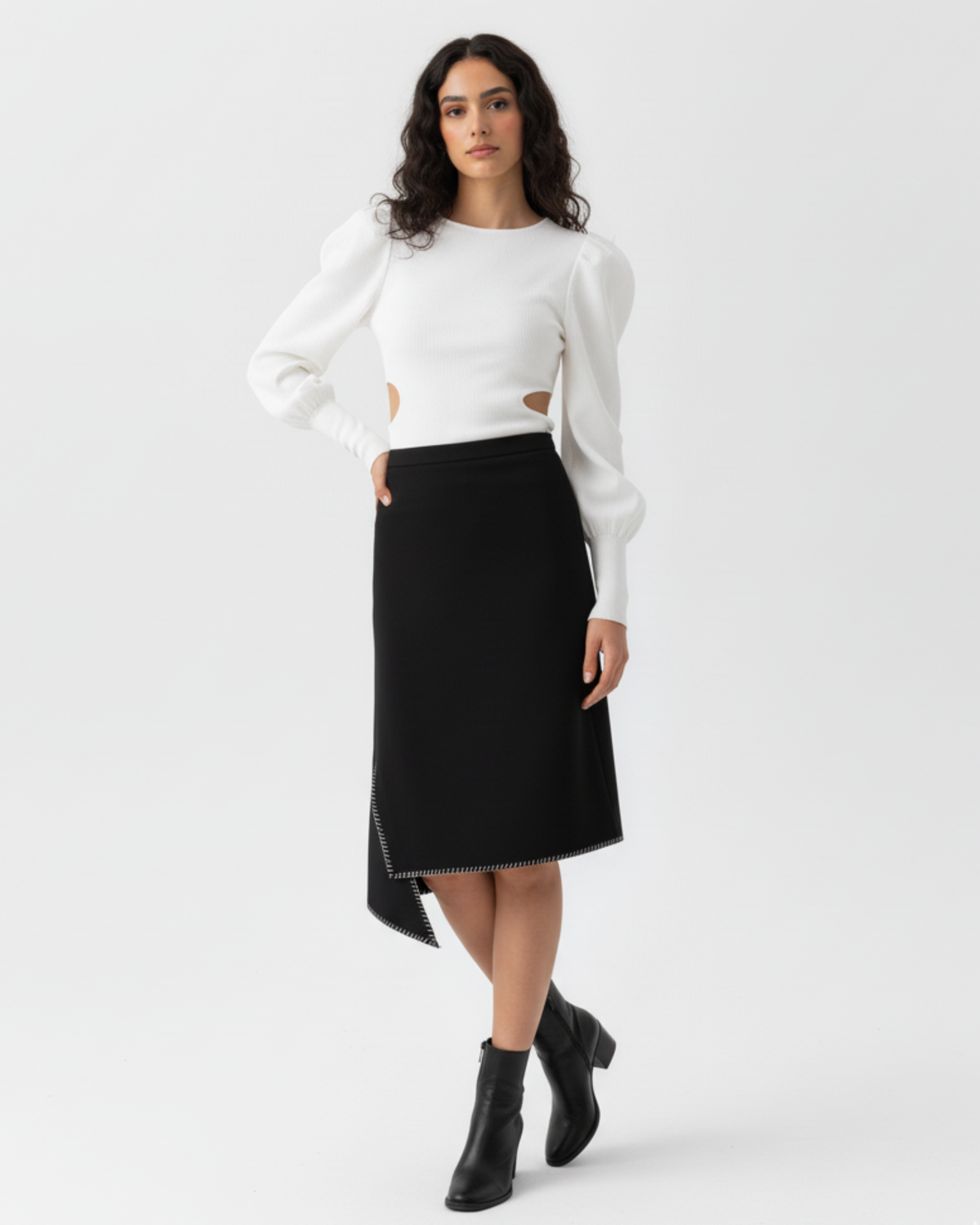 black crepe skirt with decorative white stitching