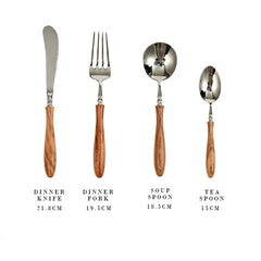 Eco-friendly flatware set on ceramic plate with napkin