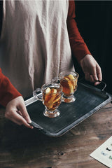 Iron storage tray on wooden table with nostalgic style