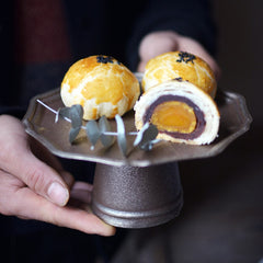 Metal dessert stand with pastries