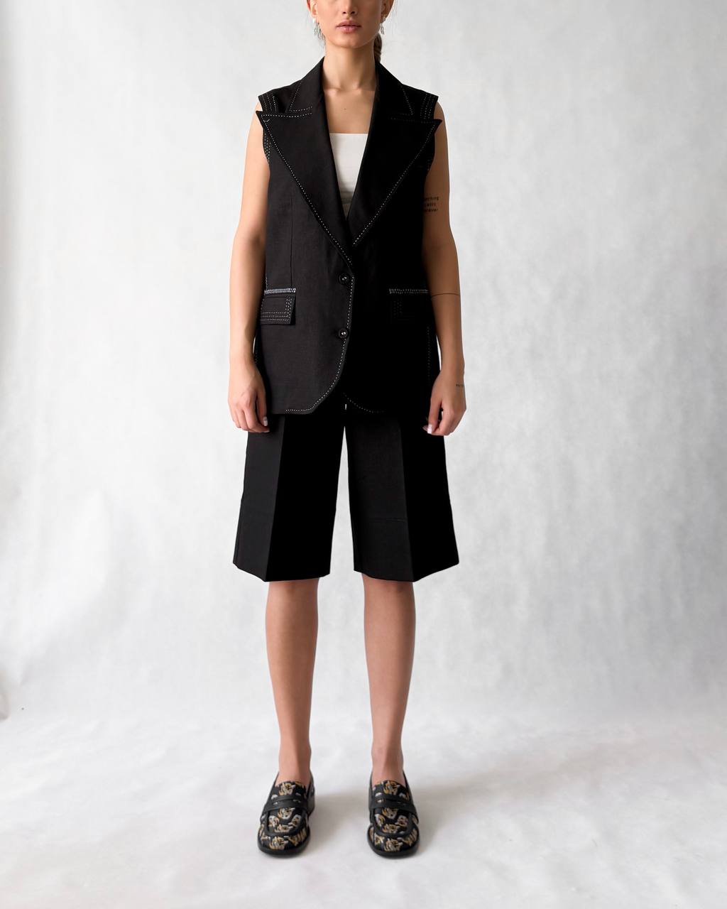 Minimalist blazer vest with flap pockets and contrast stitching