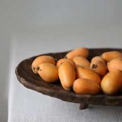 Rustic wood display tray with fruits