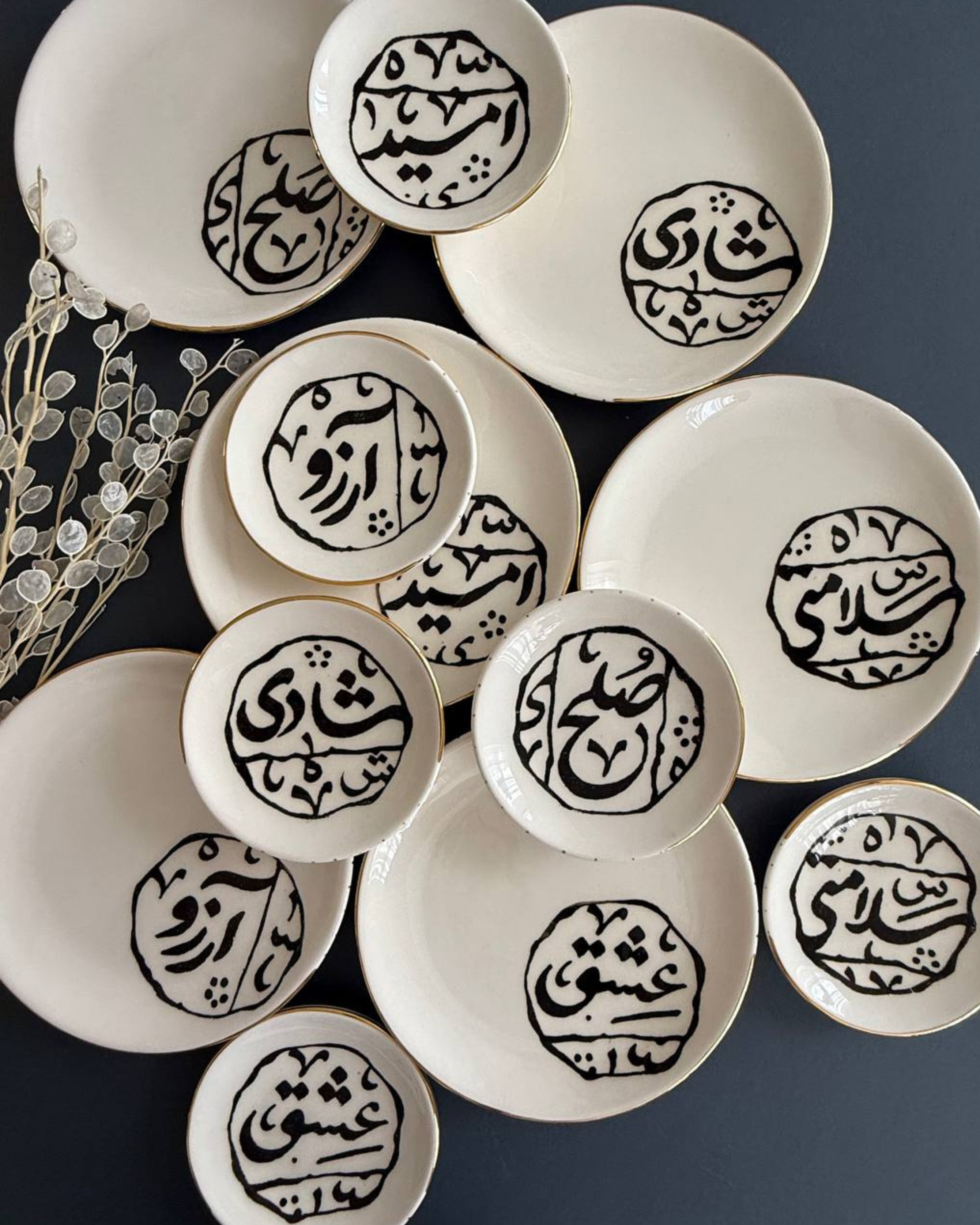 Handmade Persian calligraphy ceramic dish with black script