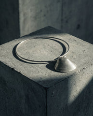 Contemporary sculptural silver pendant close up