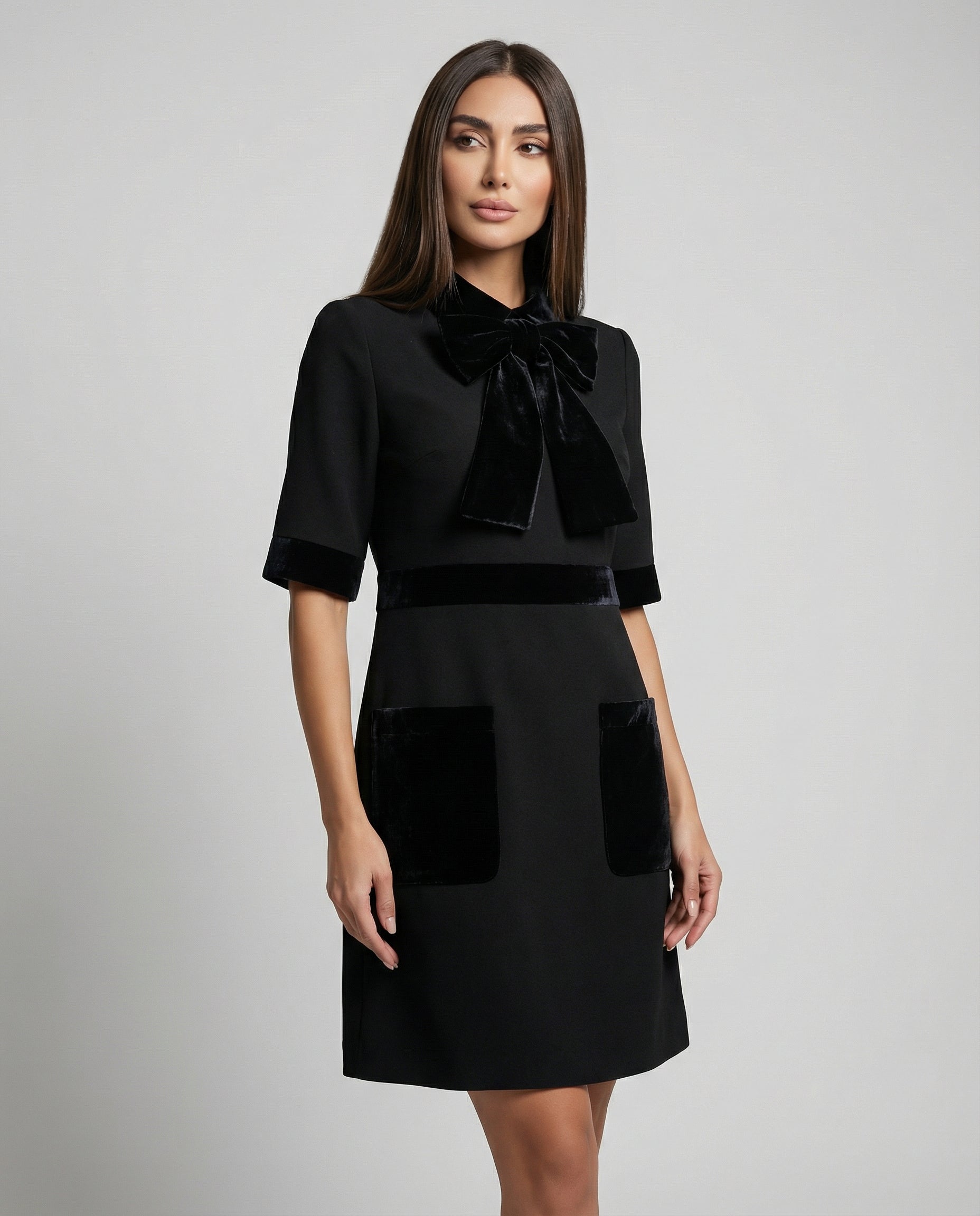 Elegant black velvet dress with tailored silhouette