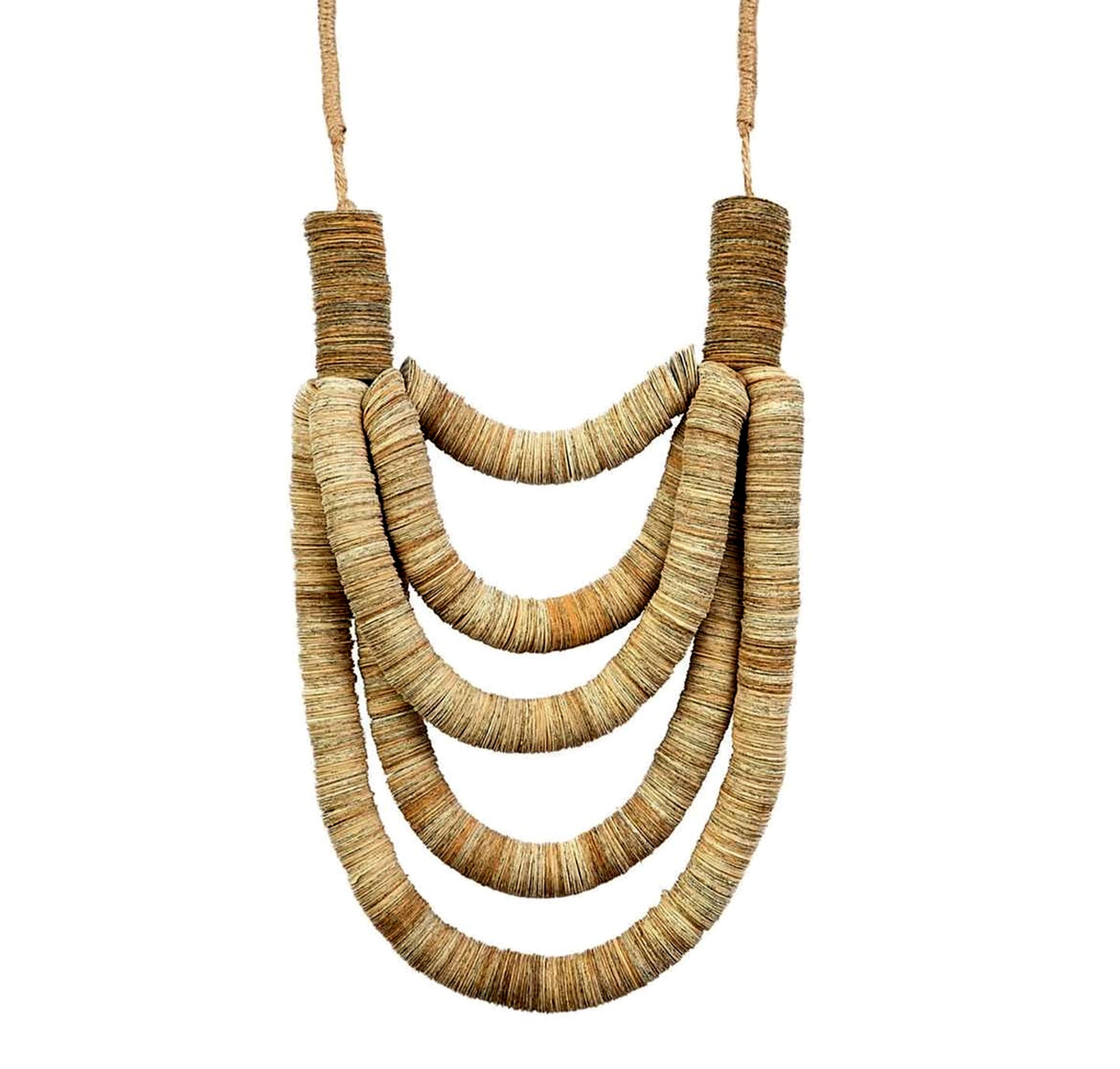 Close-up of layered statement necklace made from rolled recycled paper