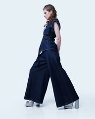 Women’s statement denim vest styled with wide-leg pants