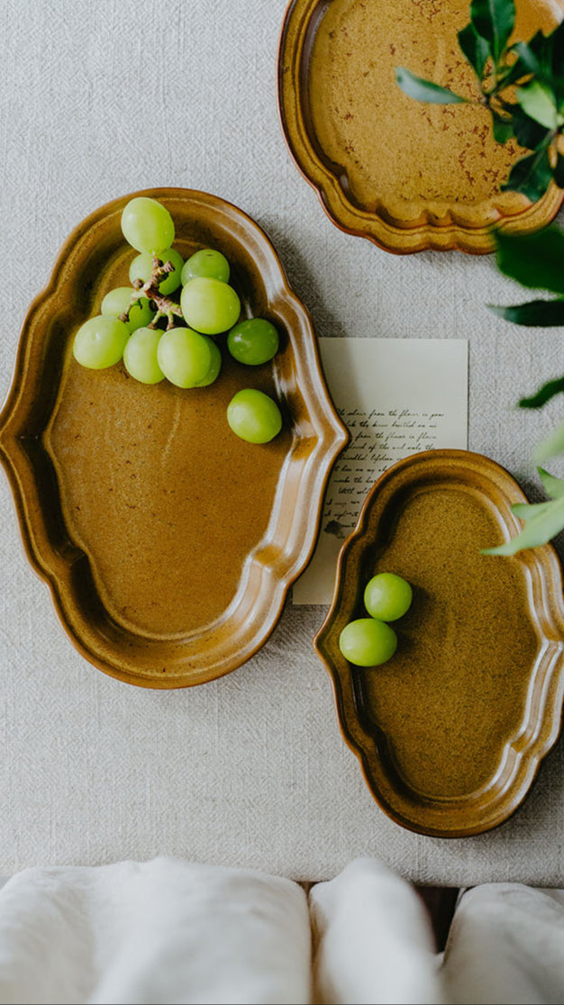 Artisanal ceramic plates in assorted shapes and sizes