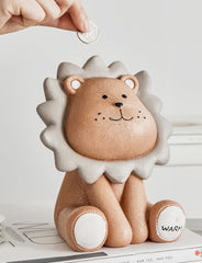 Decorative lion-shaped coin holder for nursery