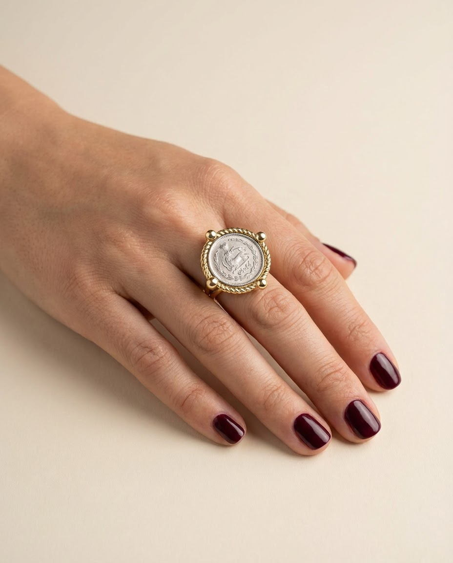 Persian coin statement ring on hand