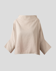 Close front view of beige linen blouse showing soft funnel neckline