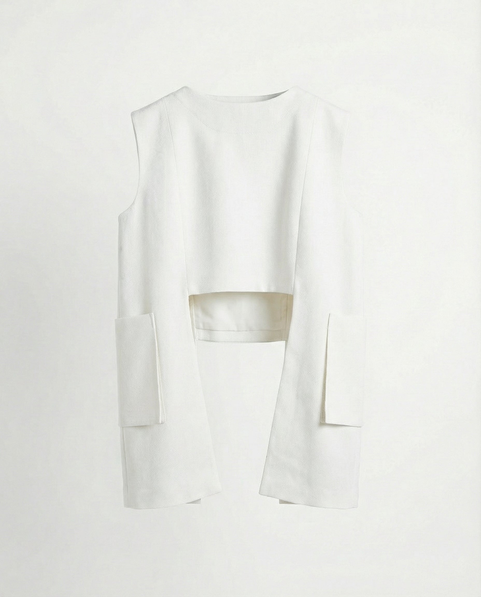 Sleeveless linen blouse with statement pockets front view