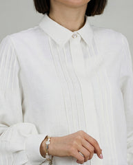 Elegant white blouse made from breathable cotton
